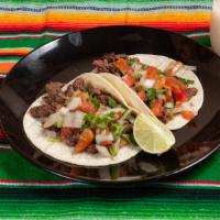 Carne Asada Tacos (2) · With pico de gallo rice and beans