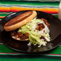 Al Pastor (Marinated Pork) · Guacamole & lettuce included