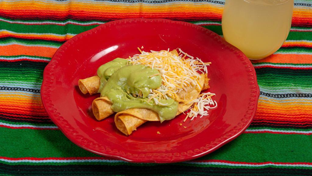 Flautas (3) · Served with guacamole and cheese. Beans and rice