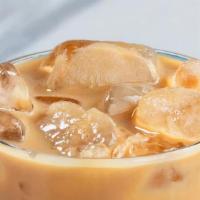 Iced Latte · Our signature lattes on ice