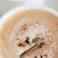 Dirty Chai Latte · Espresso with steamed, foamy milk and a Masala chai tea blend served hot. Contains dairy.