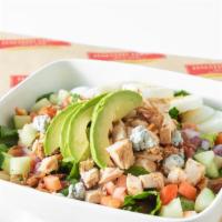 Cobb Salad · Fresh cut romaine, bacon, hard-boiled eggs, avocado, cucumber, red onion, tomato, blue chees...