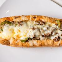 Philly Steak & Cheese · Grilled green peppers and onions smothered with Provolone cheese. Served with fries.