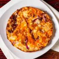 Bbq Chicken · Grilled chicken, bbq sauce, Mozzarella and Cheddar cheese, bacon and red onions.