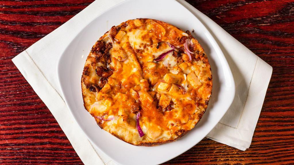 Bbq Chicken · Grilled chicken, bbq sauce, Mozzarella and Cheddar cheese, bacon and red onions.