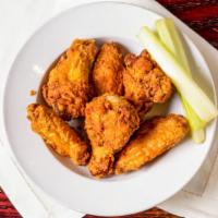 Chicken Wings · All natural fresh wings served with celery sticks and tossed in your choice of mild, hot, ho...