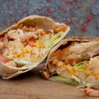 The Dre · Crispy Chicken Wrap- Crispy Chicken, Lettuce, Tomato, Ranch Sauce and Fries wrapped up.