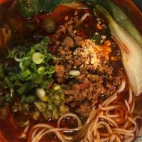 Chongqing Spicy Noodle Soup · Pickled mustard & scallion, chopped peanuts, Shanghai bok choy & minced pork.