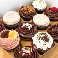 Chocolate Lover'S Dozen Box · A ready-to-go box filled with six of our chocolate center-filled cupcakes and six classic ch...