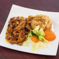 Chicken Teriyaki · Tender pieces of chicken served with Vegetables and steamed or fried rice. 640 calories.