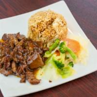 Beef Teriyaki · Sliced beef served with mixed vegetables and steamed or fried rice. 690 calories.