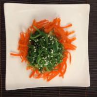 Seaweed Salad · Fresh seaweed salad marinated in sesame oil dressing.