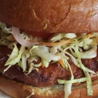 Cali Fried Chicken Sandwich · Buttermilk fried and served on a brioche bun with avocado, lettuce, tomato, grilled onions, ...