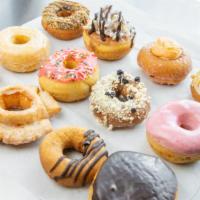 Big Baby Picks Mix 1 Dozen (Vg) · Our donuts rock... and this special pricing let's us surprise you with a mix of 12 wonderful...