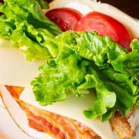 Avocado Blt · White roll, avocado spread, bacon, lettuce, tomato, mayo