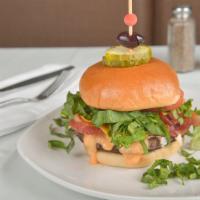 Angie'S Best Burger · Bacon, American cheese,  thousand island, arugula, tomatoes, pickles.