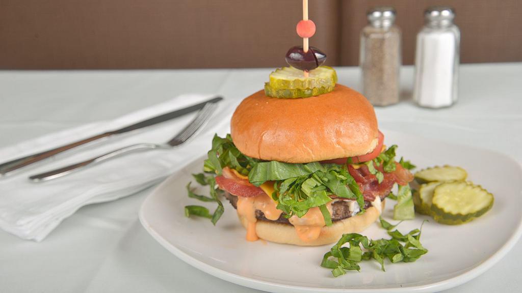 Angie'S Best Burger · Bacon, American cheese,  thousand island, arugula, tomatoes, pickles.