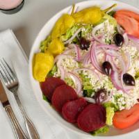 Greek Salad · Lettuce,  cherry tomatoes, beets, red onions, olives, pepperoncini, chick peas, feta cheese,...