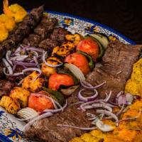 Family Platter With Seafood --- Serves Four · One skewer of barg (filet), two skewers of koubideh (our signature ground sirloin), skewer o...