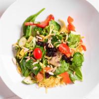 Pasta Primavera · Gluten-free available. Dried cherries, fresh vegetables, mushrooms, toasted almonds, olive o...