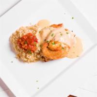 Maryland Chicken · Shrimp and crabmeat stuffing, topped with lobster cream.