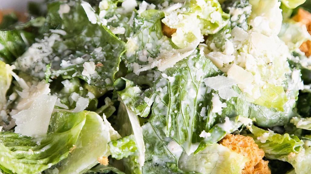 Classic Caesar Salad · Hearts of Romaine lettuce, Parmesan, and crouton. Recommended dressing - our house-made Caesar dressing.