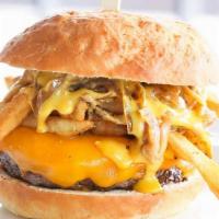 Bbq Bourbon Burger · Half-pound burger patty, bourbon onions, pork belly, Cheddar, BBQ sauce, chipotle ranch dres...