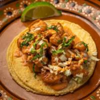 Camaron / Shrimp Taco · Cabbage slaw dressed with lime and creamy mayo chipotle sauce.