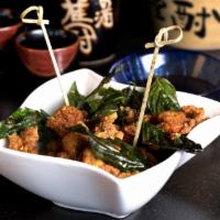 Crispy Basil Chicken · Super crispy diced chicken with fresh Thai basil and dried chillis.
