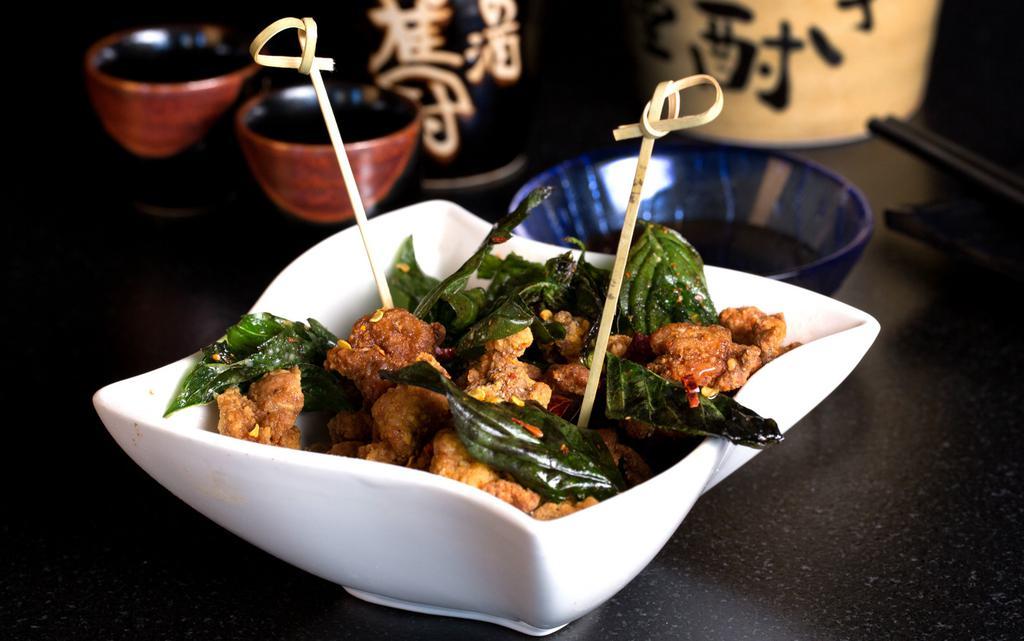 Crispy Basil Chicken · Super crispy diced chicken with fresh Thai basil and dried chillis.