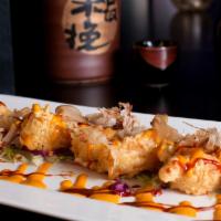 Fire Ball Shrimp · golden fried jumbo shrimp, drizzle with spicy mayo and spicy lemon sauce, sprinkled with bon...