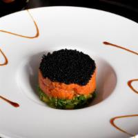 Salmon Tartar · Chopped fresh salmon with diced mango, seaweed, and topped with masago.