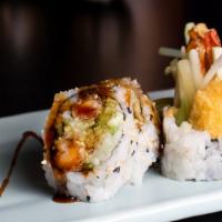 Shrimp Tempura Roll · Shrimp tempura and cucumber rolled in nori, with drizzled eel sauce.
