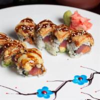Monster · Tuna, salmon, and avocado topped with a generous portion of crispy smoked tempura eel, with ...