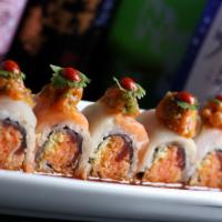 Killer J · Spicy crab, black pepper tuna and tempura crunchy inside, topped with variety fish, spicy tu...