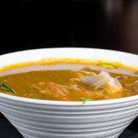 Spicy Seafood Soup · Salmon, scallop, fresh shrimp and vegetables in spicy curry coconut broth.