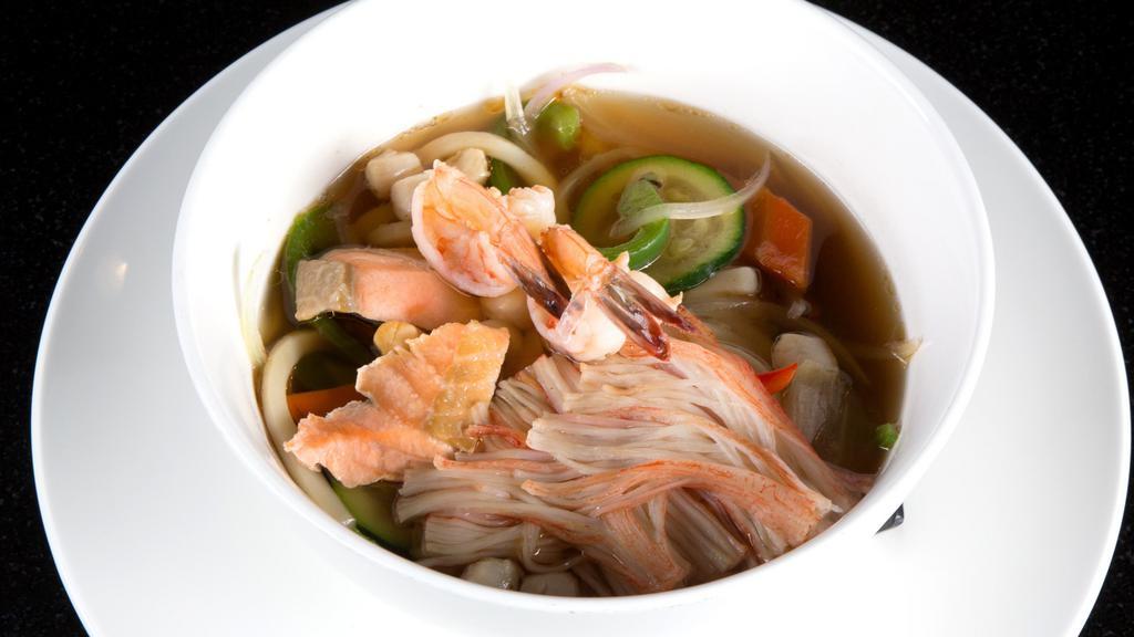 Seafood Udon Soup · Salmon, scallop, fresh shrimp and crabmeat with mushroom, zucchini, bean sprout, bell pepper, and onion.