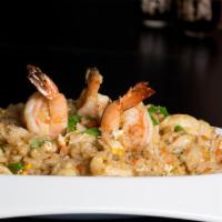 House Fried Rice · Shrimp and chicken with onion, carrot, snow peas and egg.