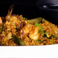Thai Style Fried Rice · Fresh shrimp, lettuce, broccoli, mushroom, onion, carrot, snow peas and egg in spicy curry f...