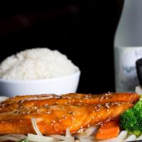 Salmon Teriyaki · Grilled fresh salmon served on a bed of sizzling onions and bell pepper in teriyaki sauce an...