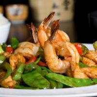Love The Sauce · Fresh shrimp and chicken with bell pepper, broccoli and snow peas in szechuan sauce, served ...