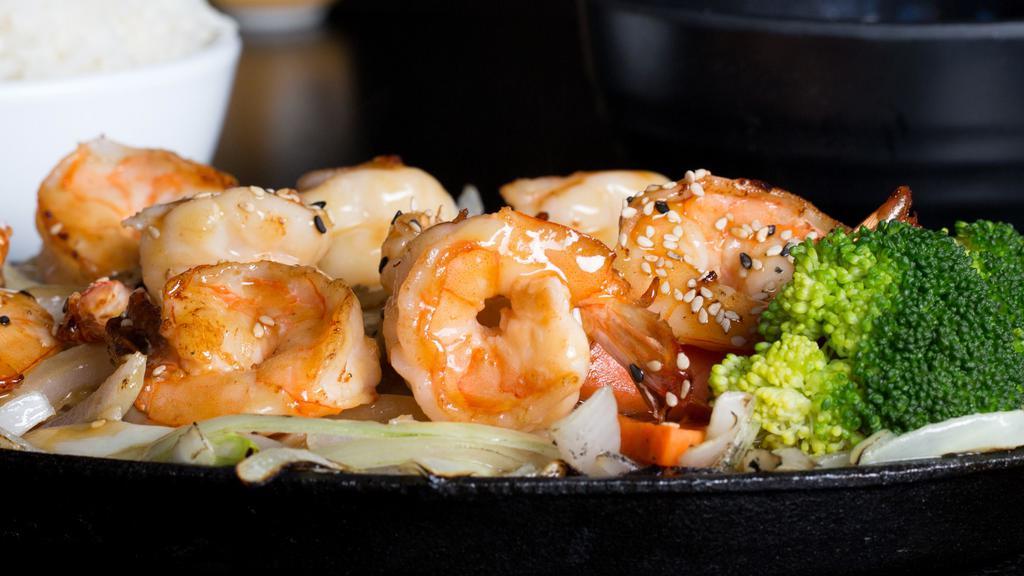 Shrimp Teriyaki · Grilled shrimp served on a bed of sizzling onions and bell pepper in teriyaki sauce and sprinkled sesame seed, served with steamed rice and miso soup