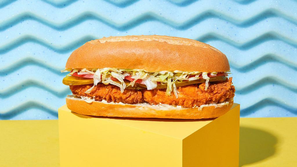 Crispy Chicken Sandwich · Crispy fried chicken with lettuce, sliced tomato, mayo, and pickles on a hoagie roll.