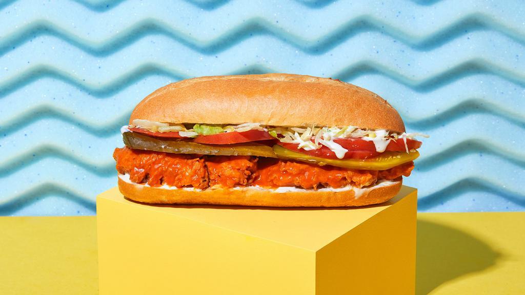 Buffalo Crispy Chicken Sandwich · Buffalo fried chicken with lettuce, tomato, ranch, and pickles on a hoagie roll.