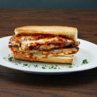Chicken Parmigiana Sandwich · Smothered with red sauce & melted mozzarella cheese.