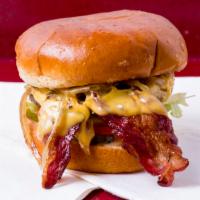 La Bacon Burger · 4 oz. premium Angus beef. Bacon, pickles, lettuce, tomato, grilled onions, double American c...