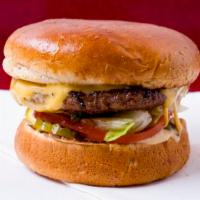 Classic Cb Burger  · 4 oz. premium Angus beef, pickles, lettuce, tomato, onions, American cheese, CB sauce® on a ...