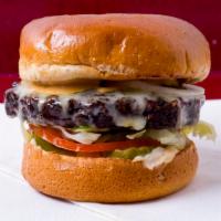 Veggie Burger  · Chipotle flavored black bean patty, pickles, lettuce, tomato, onions, Swiss cheese CB sauce®...