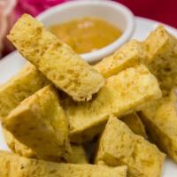 Tofu Todd · Deep-fried bean curd served with peanut sauce.