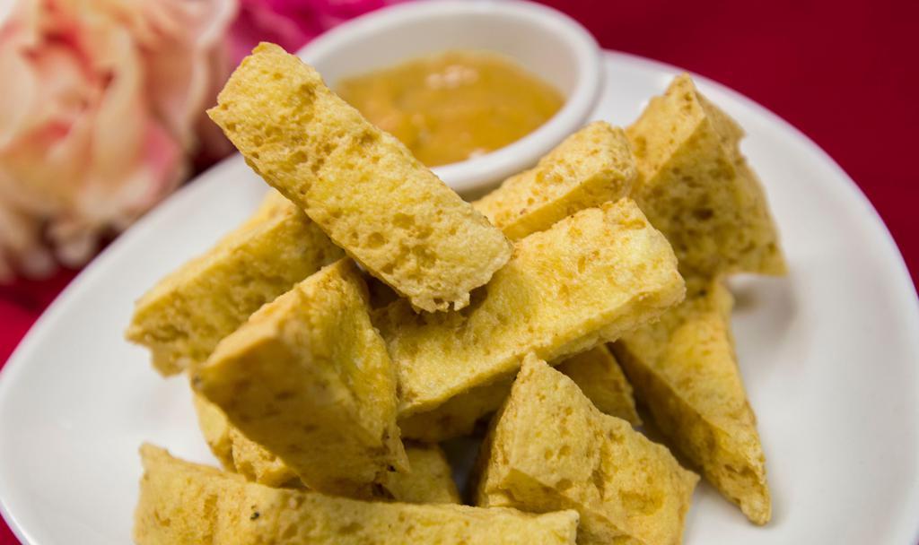 Tofu Todd · Deep-fried bean curd served with peanut sauce.